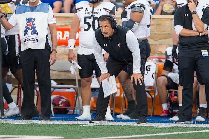 Oct 1, 2022; Tulsa, Oklahoma, USA; Cincinnati Bearcats head coach Luke Fickell looks on during the first quarter against the Tulsa Golden Hurricane at Skelly Field at H.A. Chapman Stadium. Mandatory Credit: Brett Rojo-USA TODAY Sports